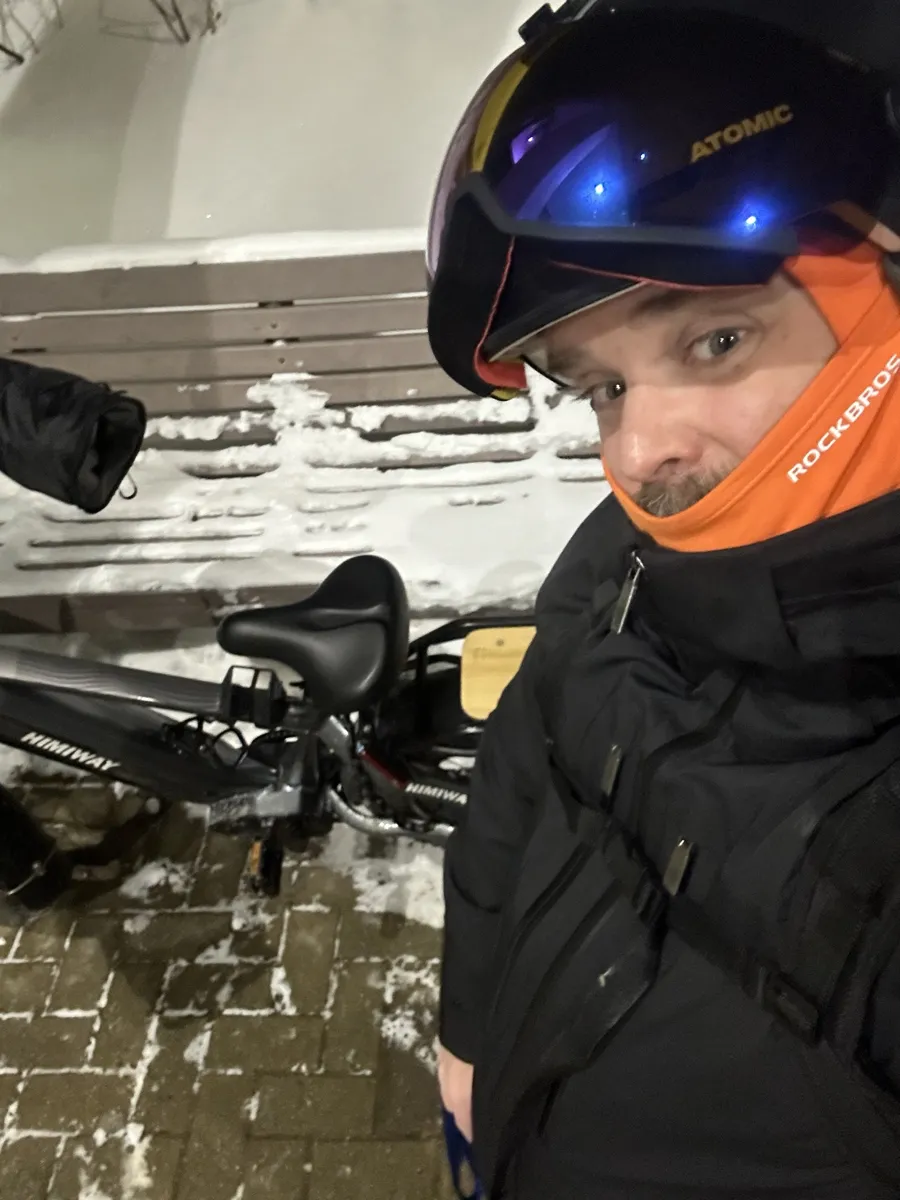 Ski helmet with visor and a warm coat: my gear.